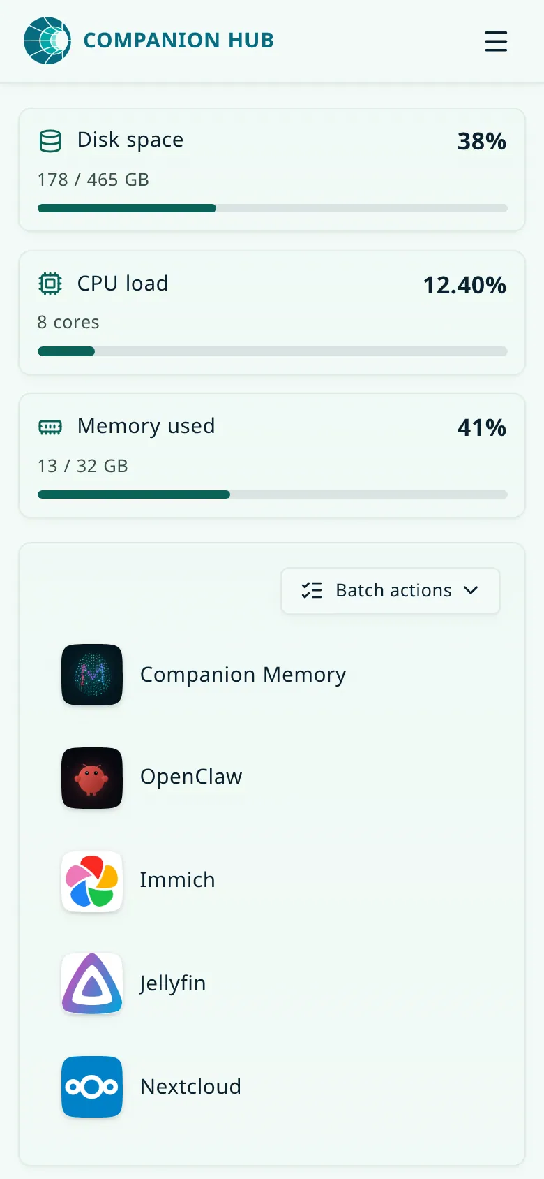 The Companion Hub dashboard at phone width: the Companion Hub name and a menu button at the top, then stacked disk space, CPU load, and memory used cards, and a Batch actions button above a single column of installed app tiles
