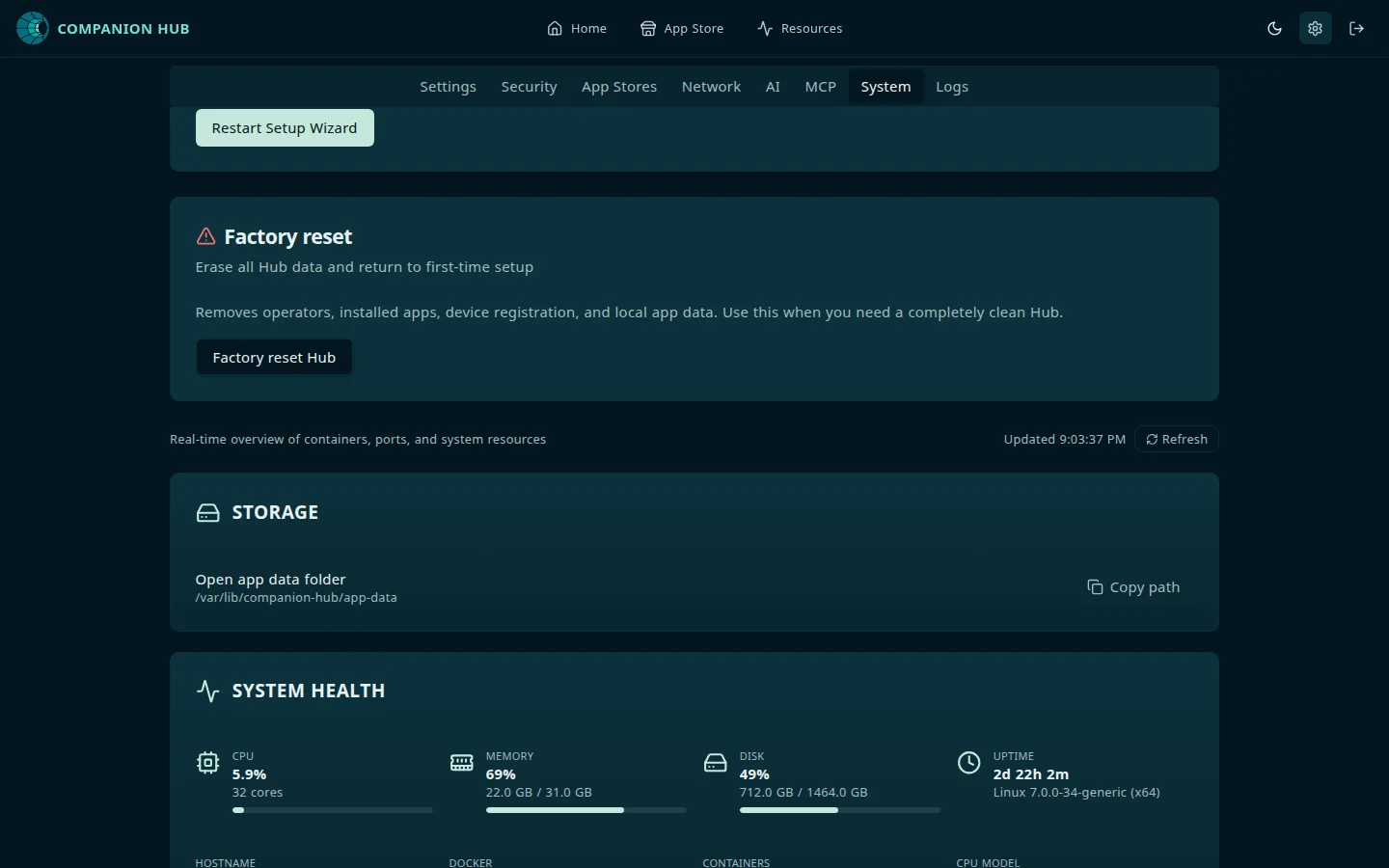 Settings, System tab, scrolled to the maintenance controls: a Restart Setup Wizard button, a Factory reset card with a Factory reset Hub button, and, below them, the inspector's header line reading Real-time overview of containers, ports, and system resources with an Updated time and a Refresh button, followed by the Storage and System health cards