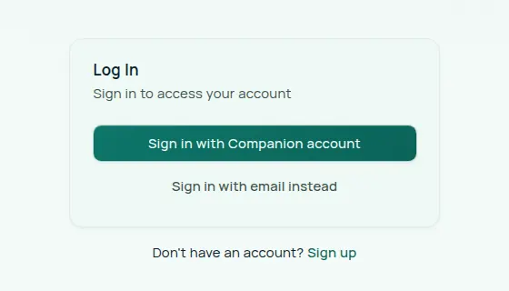 The Companion Memory sign-in page. A Log In card holds a Sign in with Companion account button and a Sign in with email instead link, and a line below it reads Don't have an account? Sign up.