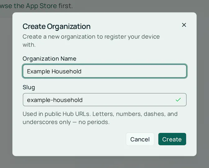 The Create Organization dialog. Organization Name holds Example Household, and Slug holds example-household with a check mark and the note that the slug is used in public Hub URLs and takes letters, numbers, dashes, and underscores only. The buttons are Cancel and Create.