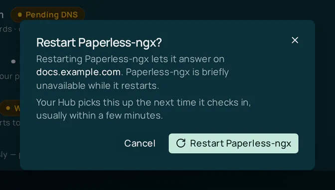 The Restart Paperless-ngx? dialog. It says restarting Paperless-ngx lets it answer on docs.example.com, that the app is briefly unavailable while it restarts, and that the Hub picks this up the next time it checks in. The buttons are Cancel and Restart Paperless-ngx.