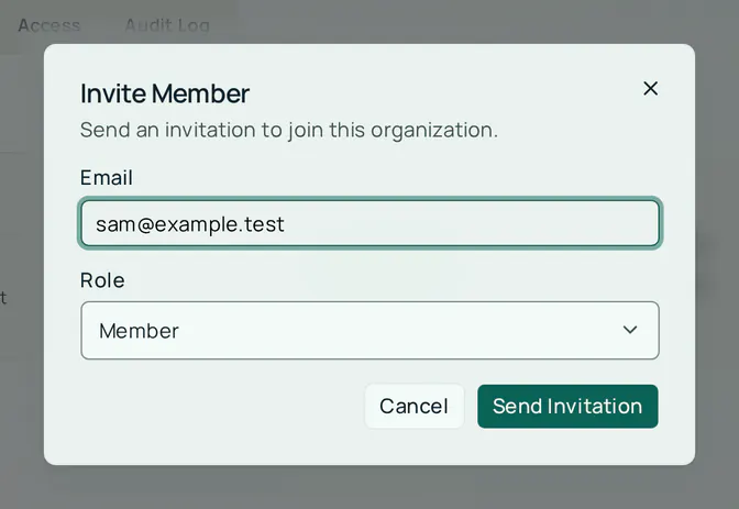 The Invite Member dialog with an Email field holding sam@example.test and a Role list set to Member, with Cancel and Send Invitation buttons.